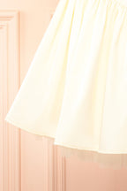 Idolia Light Yellow | Satin Cowl Neck Mini Dress with Open Lace-Up Back